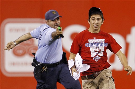 Cop taseing a Phillies fan for running around the field