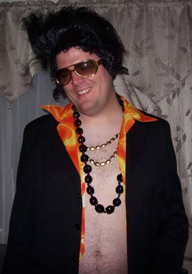 Me in a Elvis Halloween costume revealing a little too much...